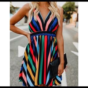 Strappy Vici Collection multi-colored mini dress.